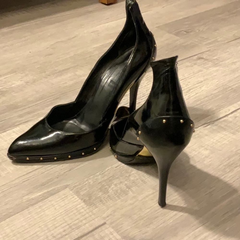 Collectible Tom Ford Gucci runway black leather stilettos with gold studs.